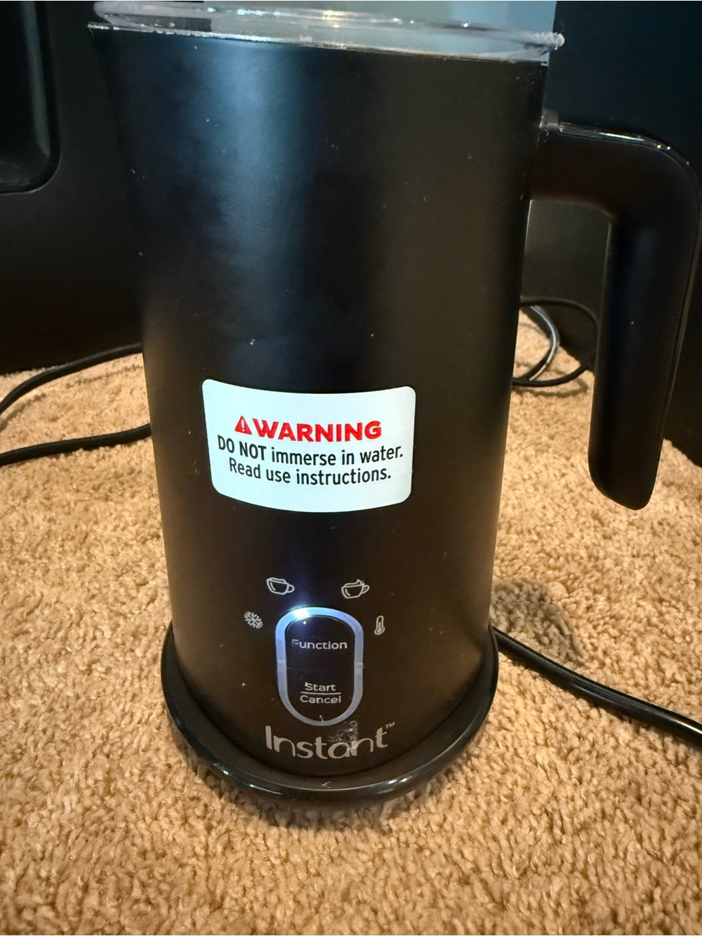 black Instant Pot 4-in-1 electric milk frother and steamer
